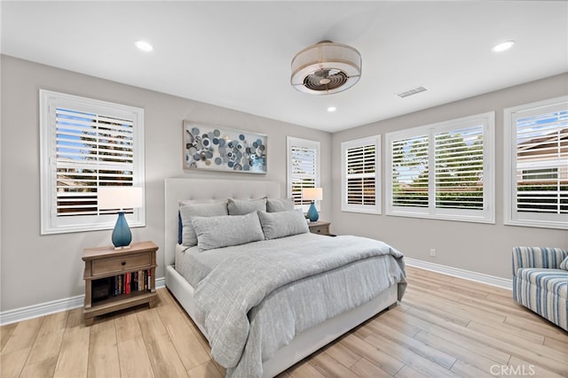 bedroom with light hardwood / wood-style floors