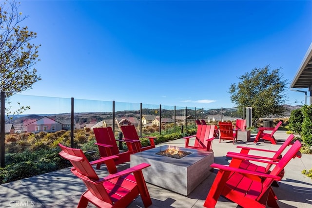 view of patio / terrace featuring a fire pit