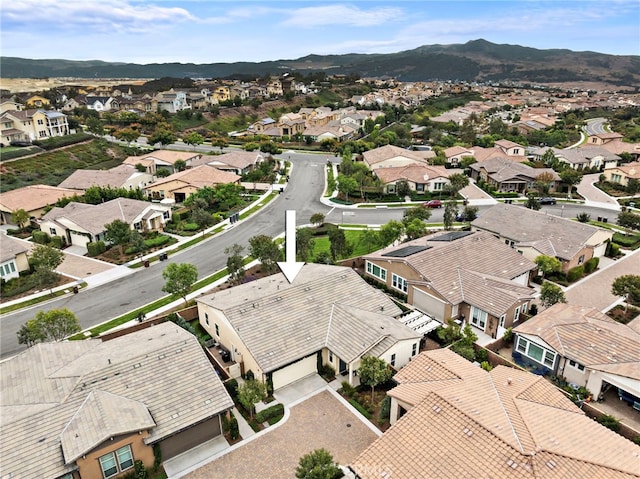 drone / aerial view featuring a mountain view