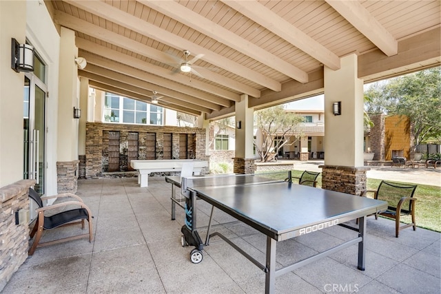 view of patio featuring ceiling fan