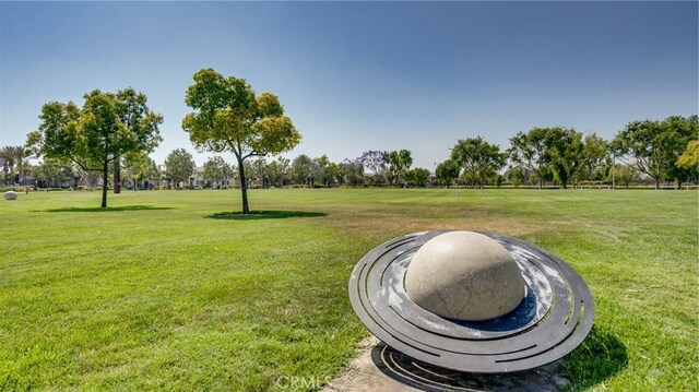 view of community with a lawn