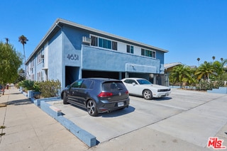 view of building exterior with a carport