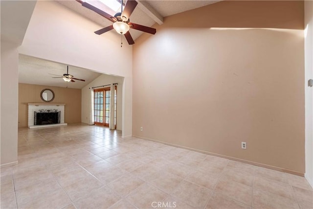 unfurnished living room with a textured ceiling, lofted ceiling with beams, and ceiling fan