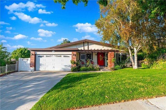 view of front of property featuring a garage and a front lawn