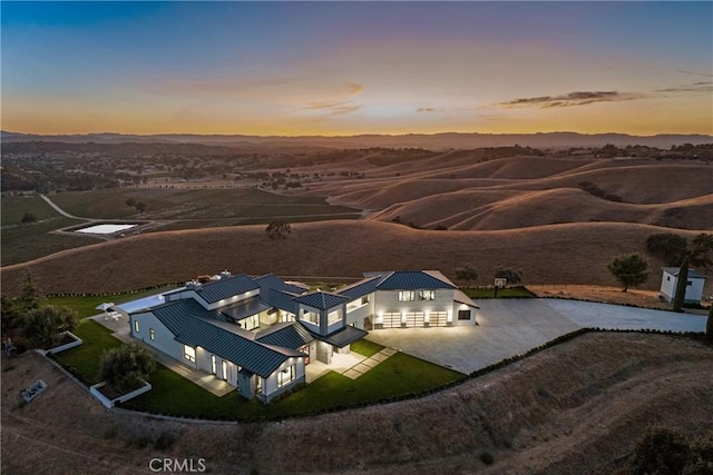 view of aerial view at dusk