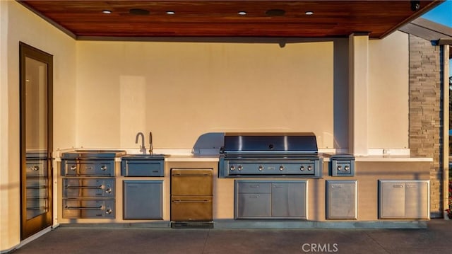 view of patio with a grill