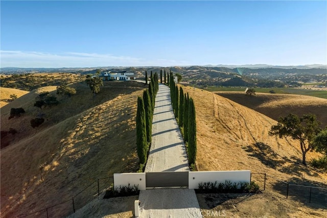 aerial view with a mountain view and a rural view