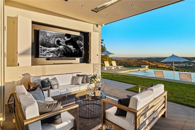 view of patio featuring a pool