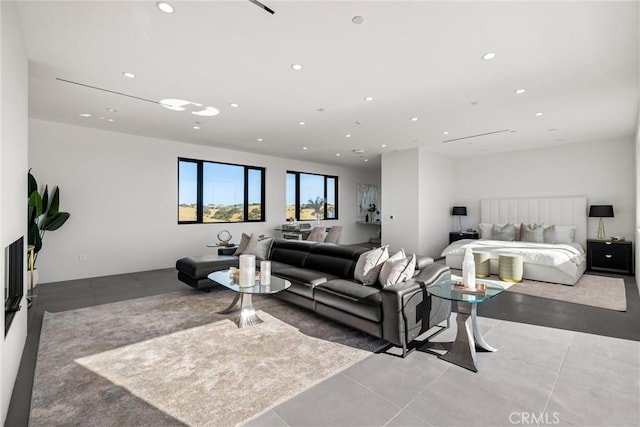 tiled living room with recessed lighting