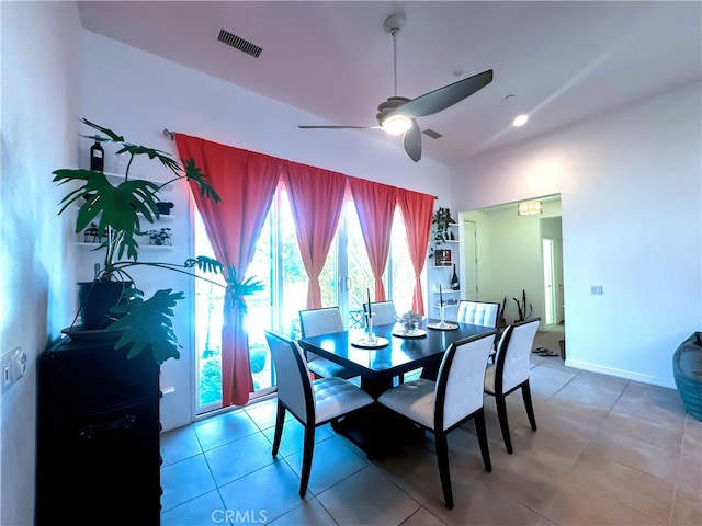 dining room with light tile patterned flooring and ceiling fan