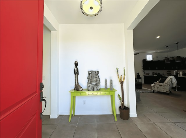 foyer entrance featuring tile patterned flooring