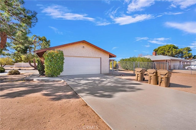 view of side of property featuring a garage