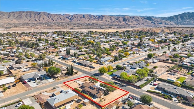 drone / aerial view featuring a mountain view