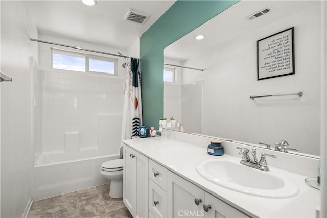 full bathroom featuring vanity, toilet, and shower / bath combo with shower curtain