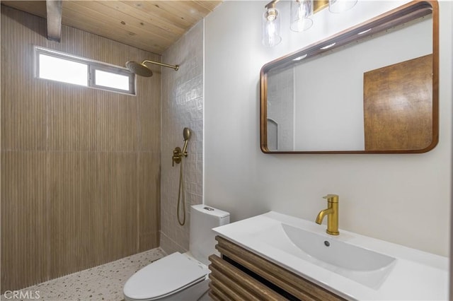 full bathroom with wood ceiling, tiled shower, vanity, and toilet