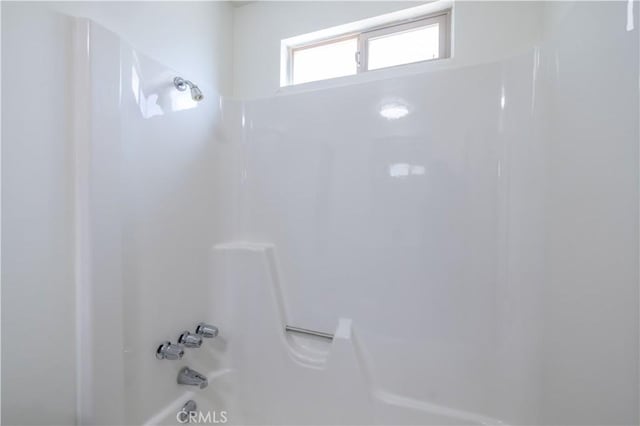 bathroom with shower / tub combination