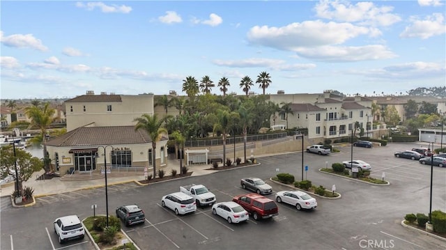 4344 Tradewinds Dr, Oxnard, CA 93035 - view of building exterior featuring uncovered parking and a residential view