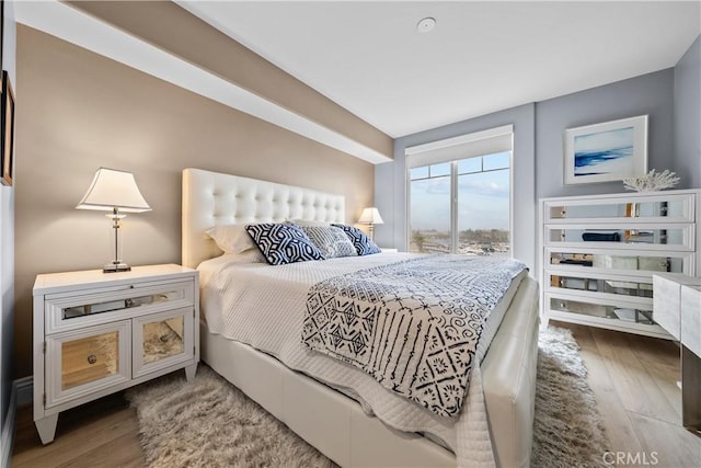 4344 Tradewinds Dr, Oxnard, CA 93035 - bedroom featuring wood finished floors and access to exterior