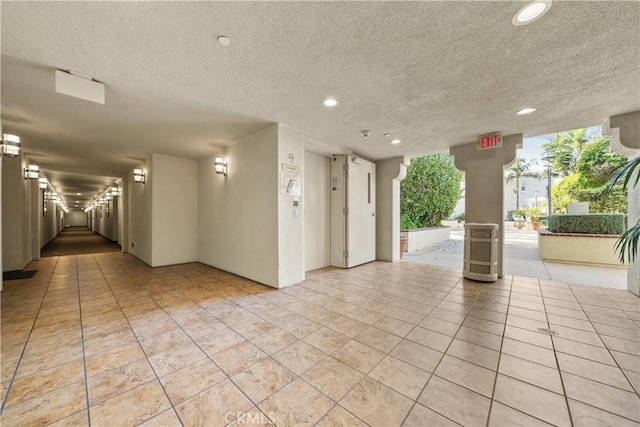 4344 Tradewinds Dr, Oxnard, CA 93035 - lobby with a textured ceiling, recessed lighting, and stairway