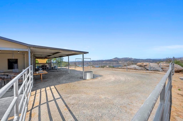 exterior space with a mountain view and a rural view