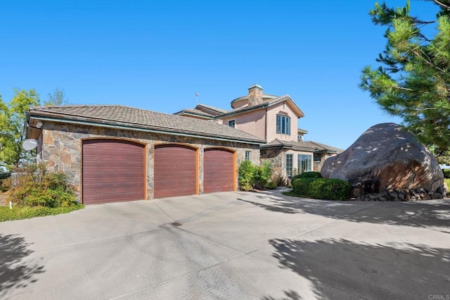 view of front of home featuring a garage