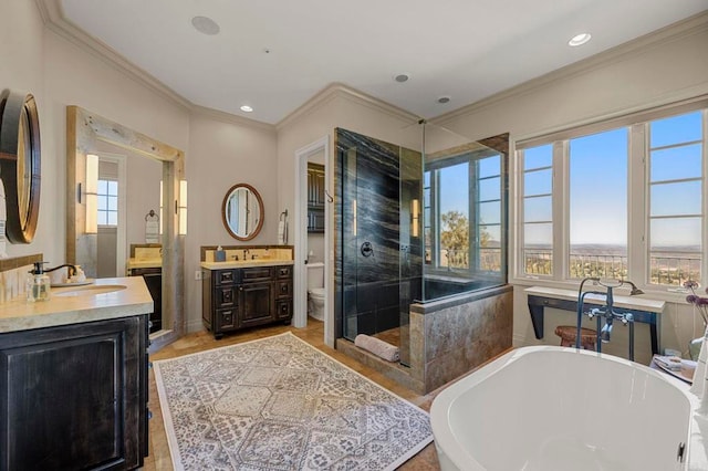 full bathroom featuring crown molding, vanity, shower with separate bathtub, and toilet