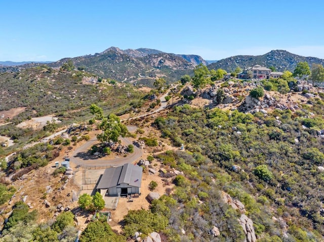 drone / aerial view featuring a mountain view