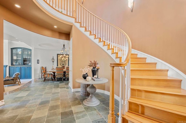 stairway with a high ceiling