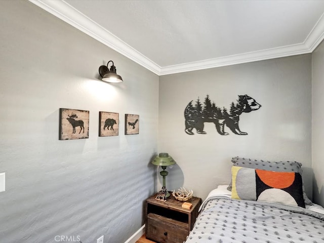 bedroom featuring crown molding