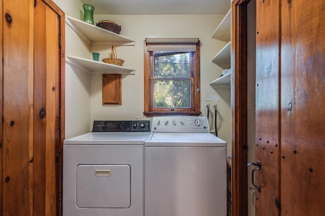 laundry room featuring washing machine and dryer