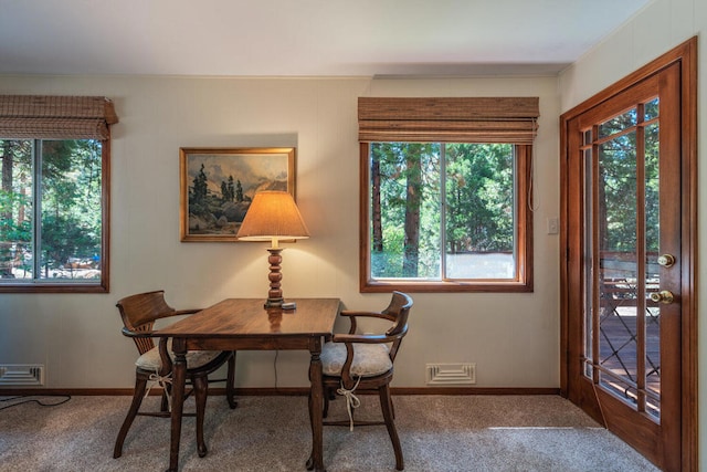 dining space with carpet