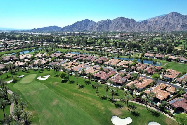 bird's eye view with a water and mountain view