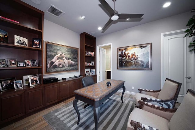 office featuring hardwood / wood-style floors and ceiling fan