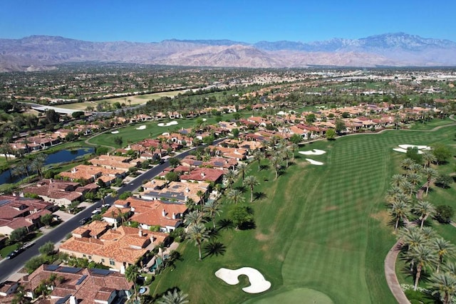 bird's eye view with a water and mountain view