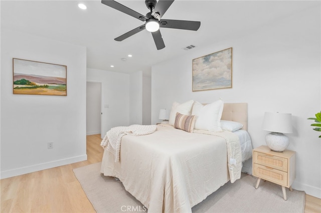 bedroom featuring ceiling fan and light wood-type flooring