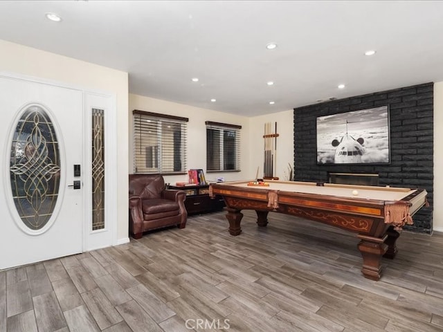 rec room featuring billiards and light wood-type flooring