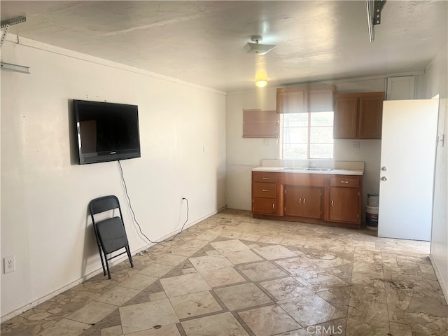 kitchen featuring crown molding