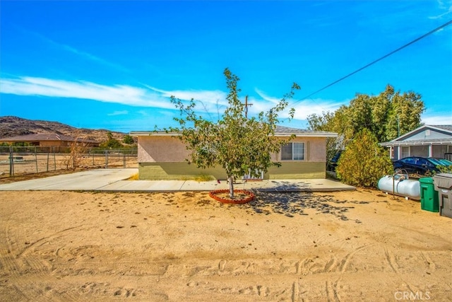 exterior space featuring a mountain view