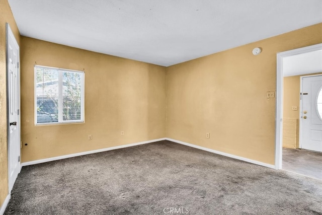 empty room with carpet flooring