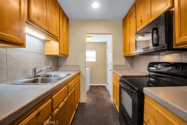 kitchen featuring sink, black appliances, and decorative backsplash