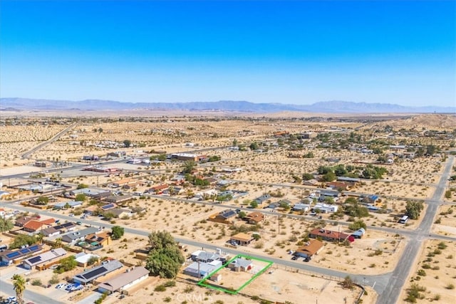 bird's eye view with a mountain view