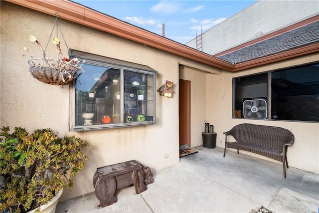 doorway to property with a patio area