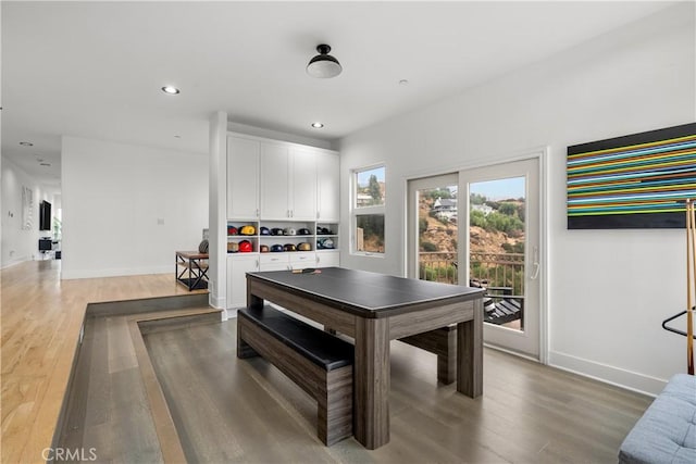 interior space with dark hardwood / wood-style flooring