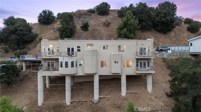 8350 Hillcroft Dr, West Hills, CA 91304 - view of front of home with a balcony and stucco siding