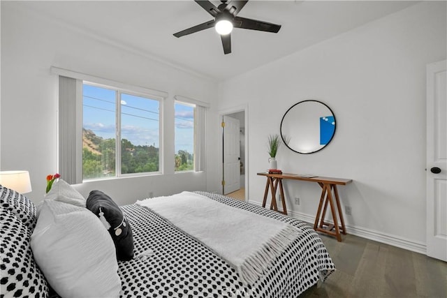 bedroom featuring ceiling fan and wood-type flooring