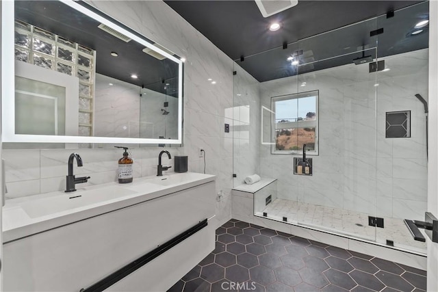 8350 Hillcroft Dr, West Hills, CA 91304 - full bathroom featuring tile patterned flooring, tile walls, a stall shower, and double vanity