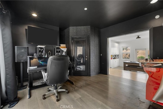 office area with light hardwood / wood-style floors