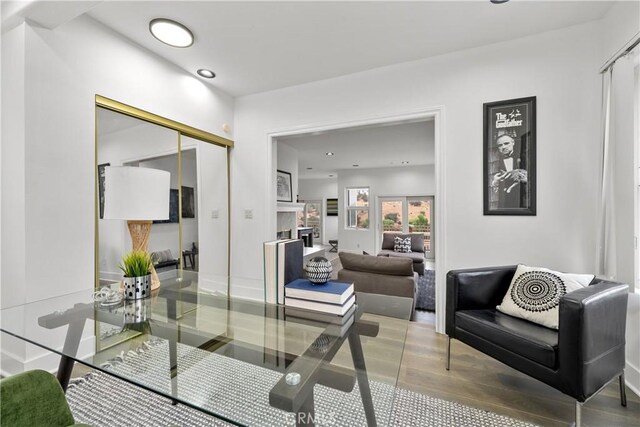 8350 Hillcroft Dr, West Hills, CA 91304 - home office featuring a fireplace, wood finished floors, and recessed lighting