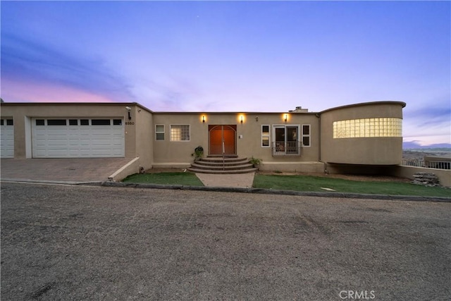 view of front of property featuring a garage