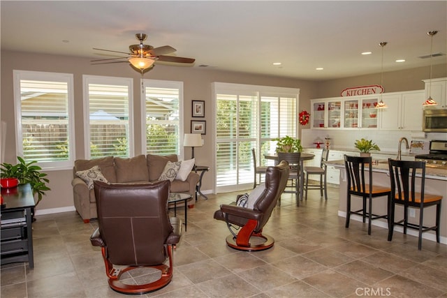 living room with ceiling fan